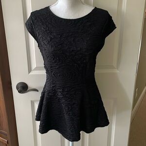 Women’s black patterned top